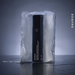 Black Davroe product encased in ice on a reflective surface with a gray background
