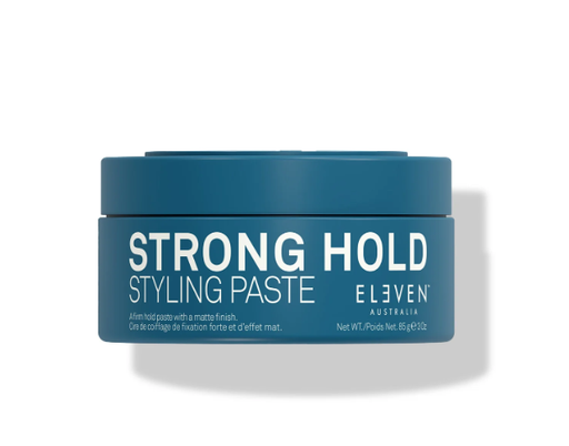 A container of Eleven Australia Strong Hold Styling Paste with a blue label, indicating a firm hold for styling hair.