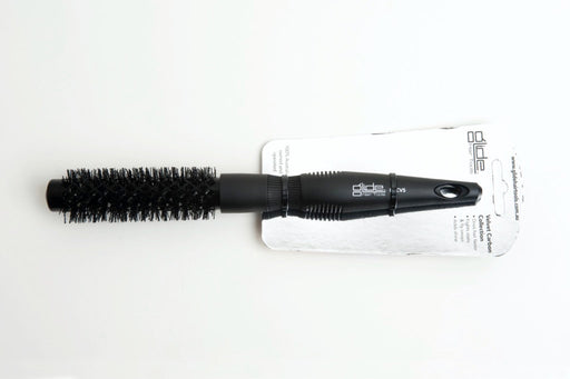 A black carbon-coated Velvet Carbon Very Small Brush with a 20mm width, placed on a white surface with a brand tag attached to it.