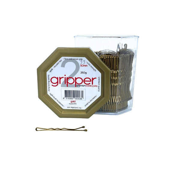 Gold hair pins in a container with 'gripper' branding on a white background