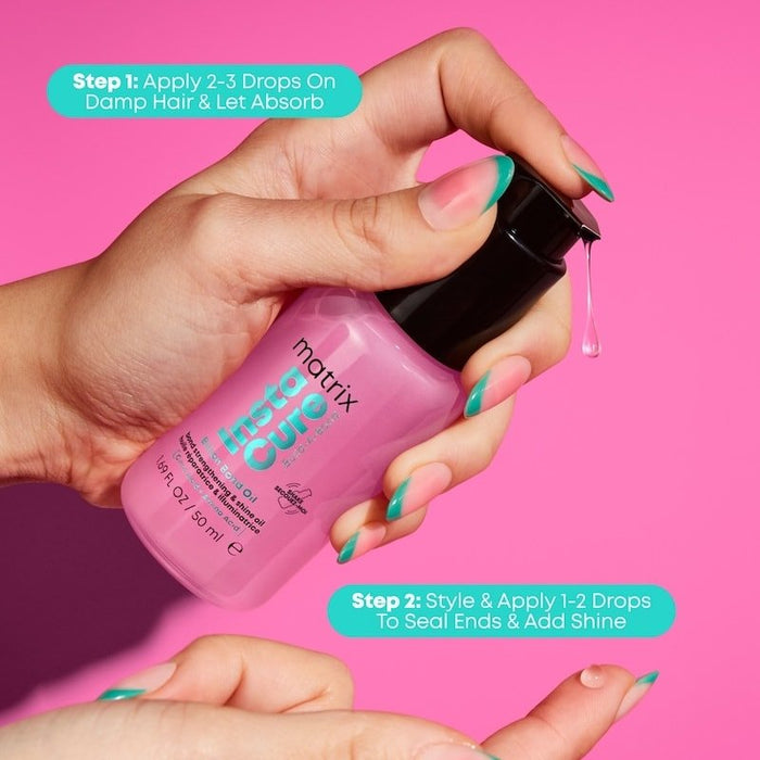 Hand holding a pink bottle of Matrix InstaCure product with application steps on a pink background