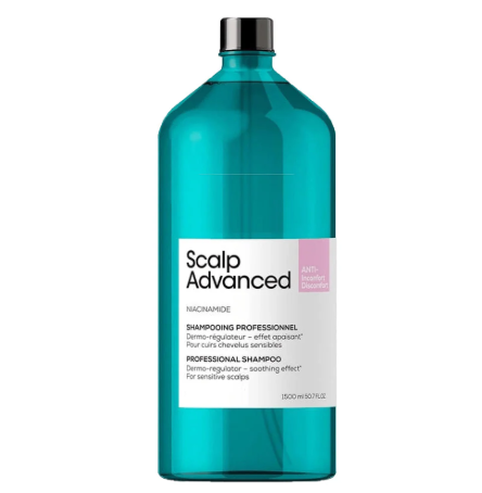 Blue bottle of Scalp Advanced shampoo on a white background