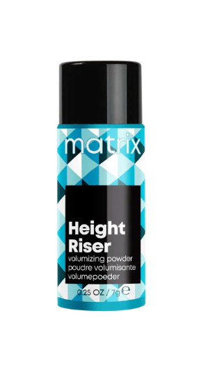 A bottle of Matrix Height Riser Volumizing Powder, with a black and blue geometric design on the label.