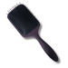 A dark purple and black paddle hairbrush shown at an angle on a plain white background.