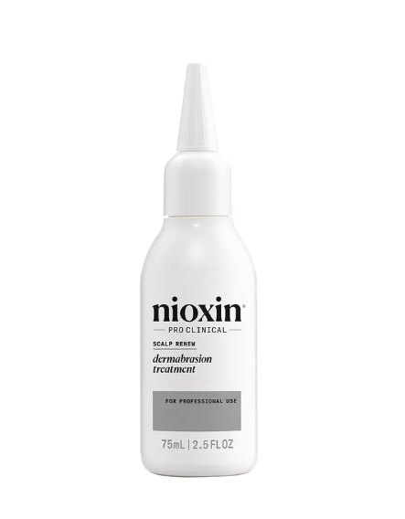 A bottle of Nioxin Scalp Renew Dermabrasion Treatment with a white pump dispenser, labeled for professional use and containing 75ml of product.