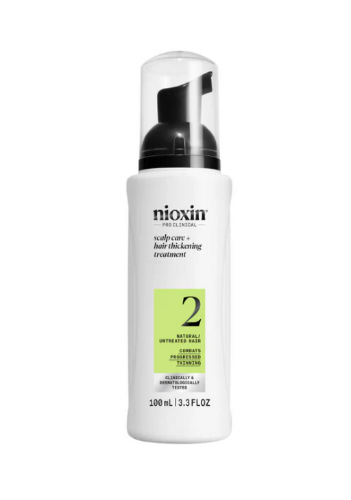 A bottle of Nioxin System 2 Scalp Treatment, 100ml.