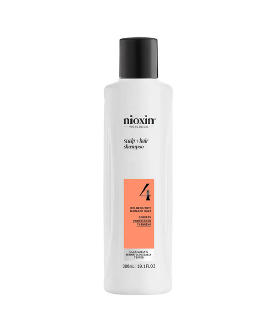 A bottle of Nioxin System 4 Scalp + Hair Shampoo, 300ml size, with label and cap visible.