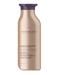 A bottle of Pureology Nanoworks Gold Shampoo with a capacity of 266ml, designed for color-treated hair.