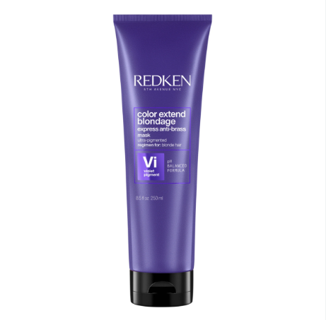 Redken hair care product on a white background
