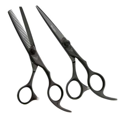 Black hairdressing scissors and comb on a white background