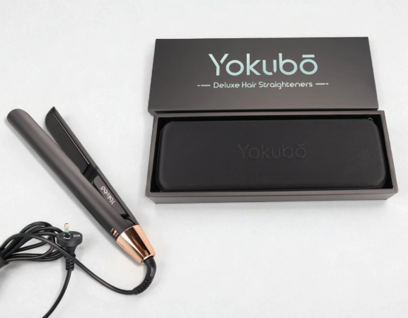 Yokubö hair straightener with packaging on a white background