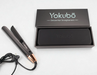 Yokubö hair straightener with packaging on a white background
